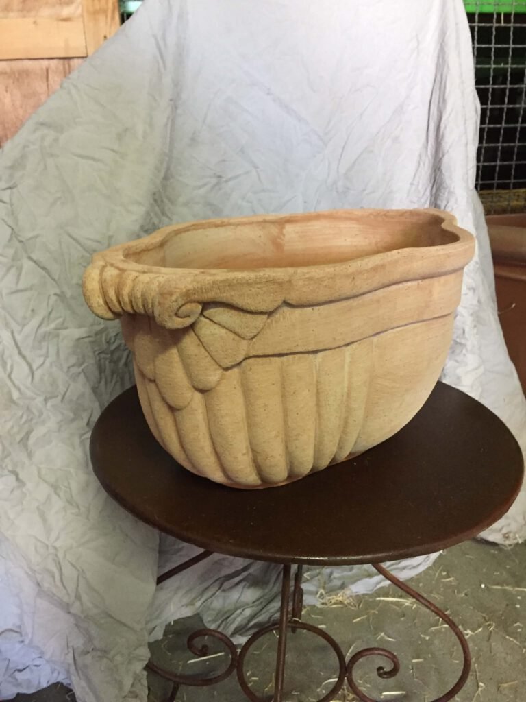 OVALE CON MANICI en terre cuite de Toscane: L:50, H:22